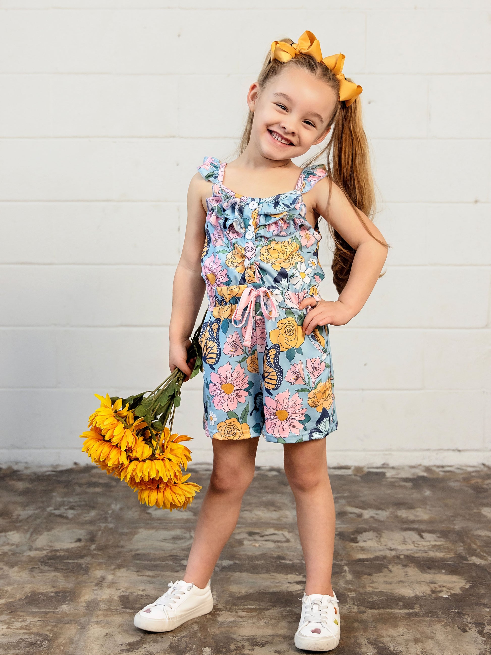 Chasing Butterflies Romper on a model