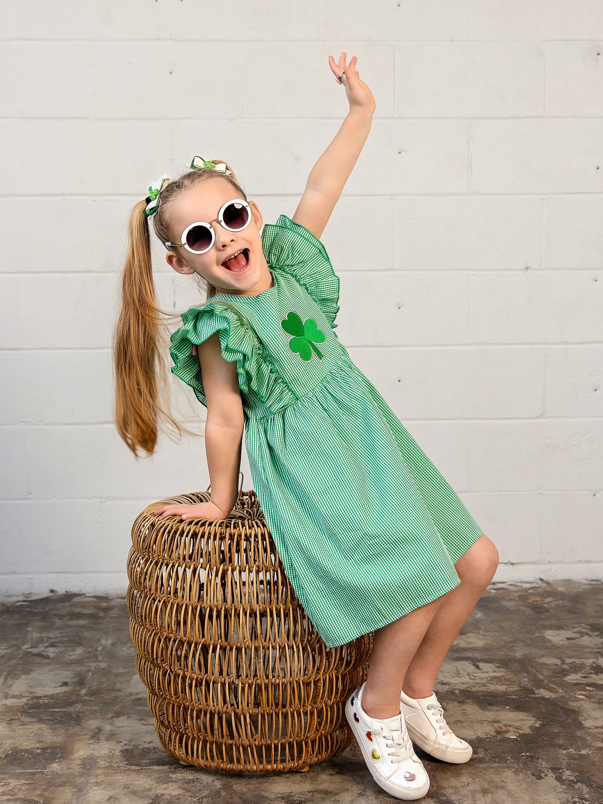 Embroidered Clover Green Gingham Dress on a model