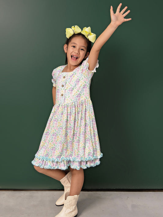 Pastel Floral Double Ruffle Dress on a model