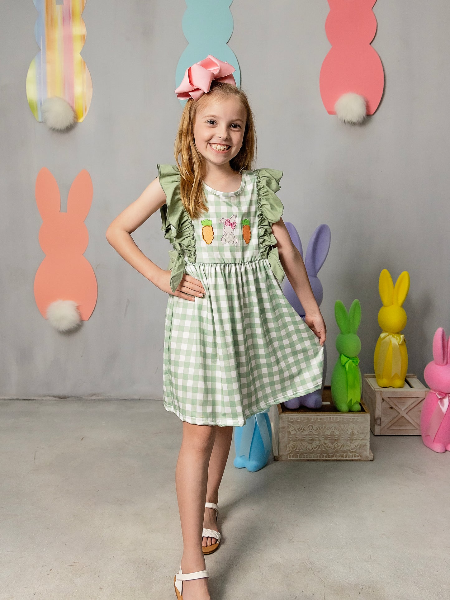 Classic Easter Eggs Ruffled Apron Dress on a model