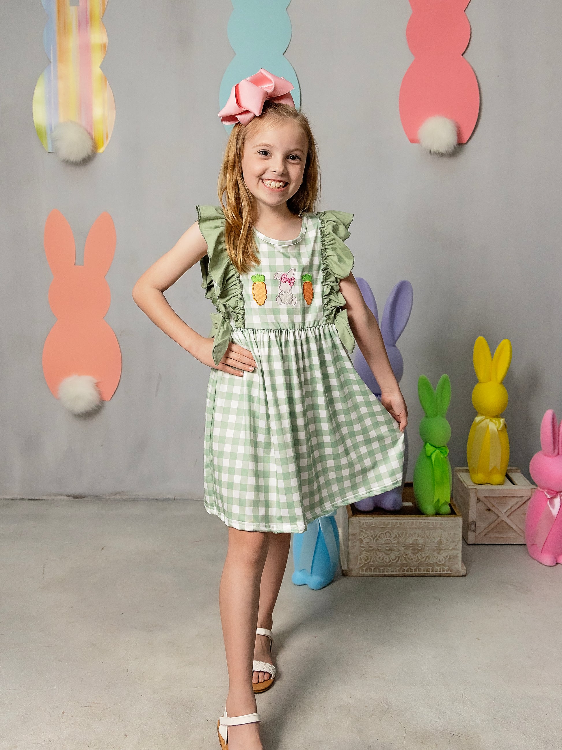 Classic Easter Eggs Ruffled Apron Dress on a model