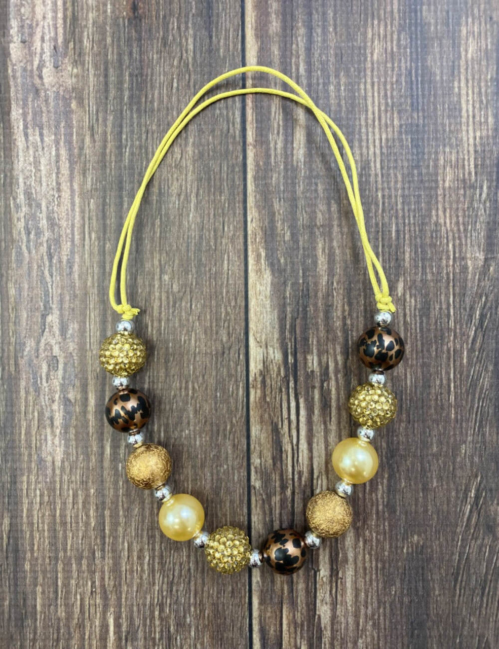 Adjustable brown, animal print and gold necklace, 17"