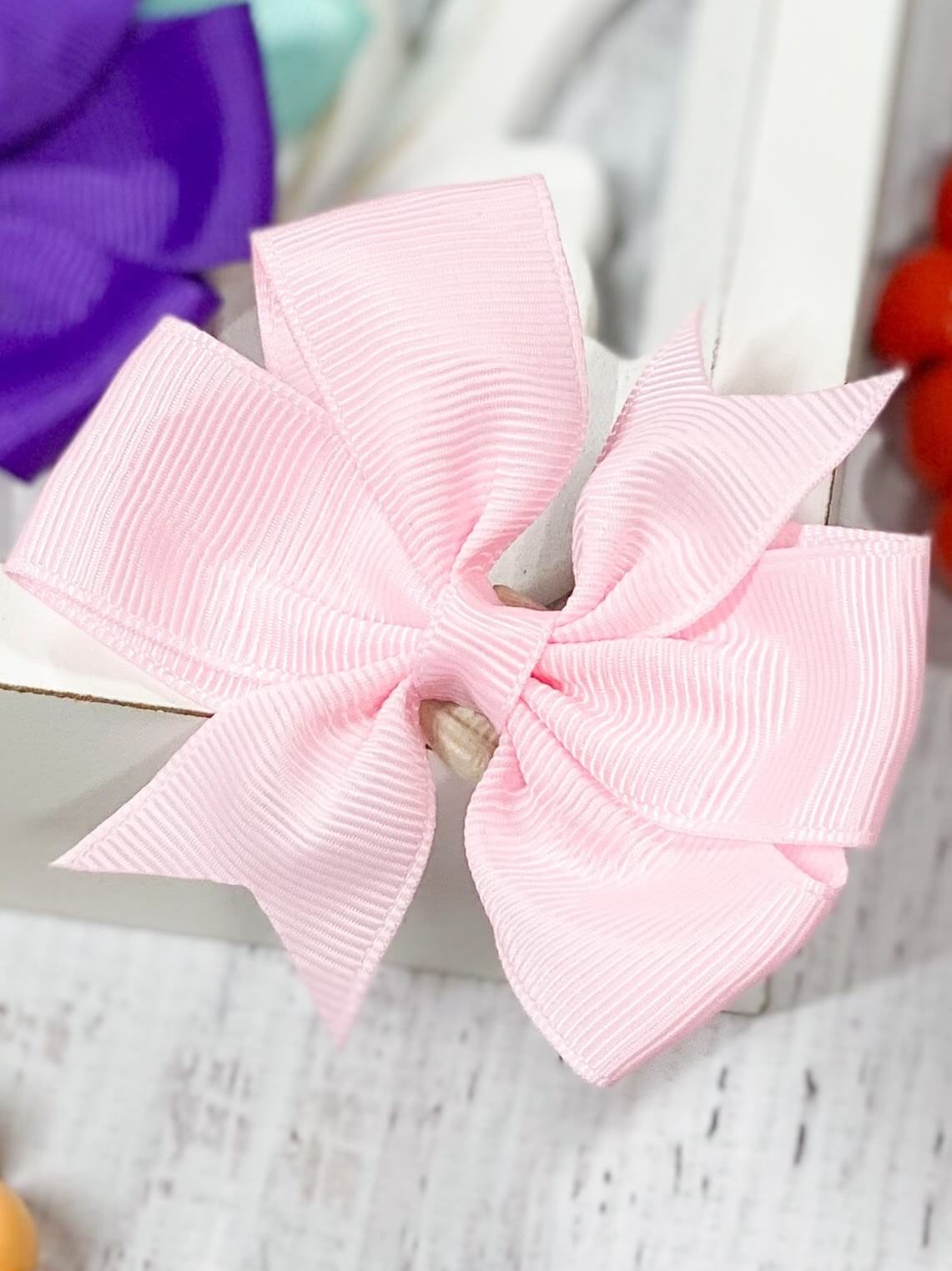 light pink pinwheel bow