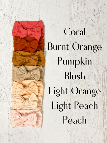 Cable Knit Bow Headbands in Coral, Burnt Orange, Pumpkin, Blush, Light Orange, Light Peach, Peach