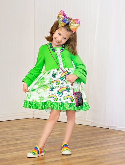 Green patchwork dress with rainbows & shamrocks design. 