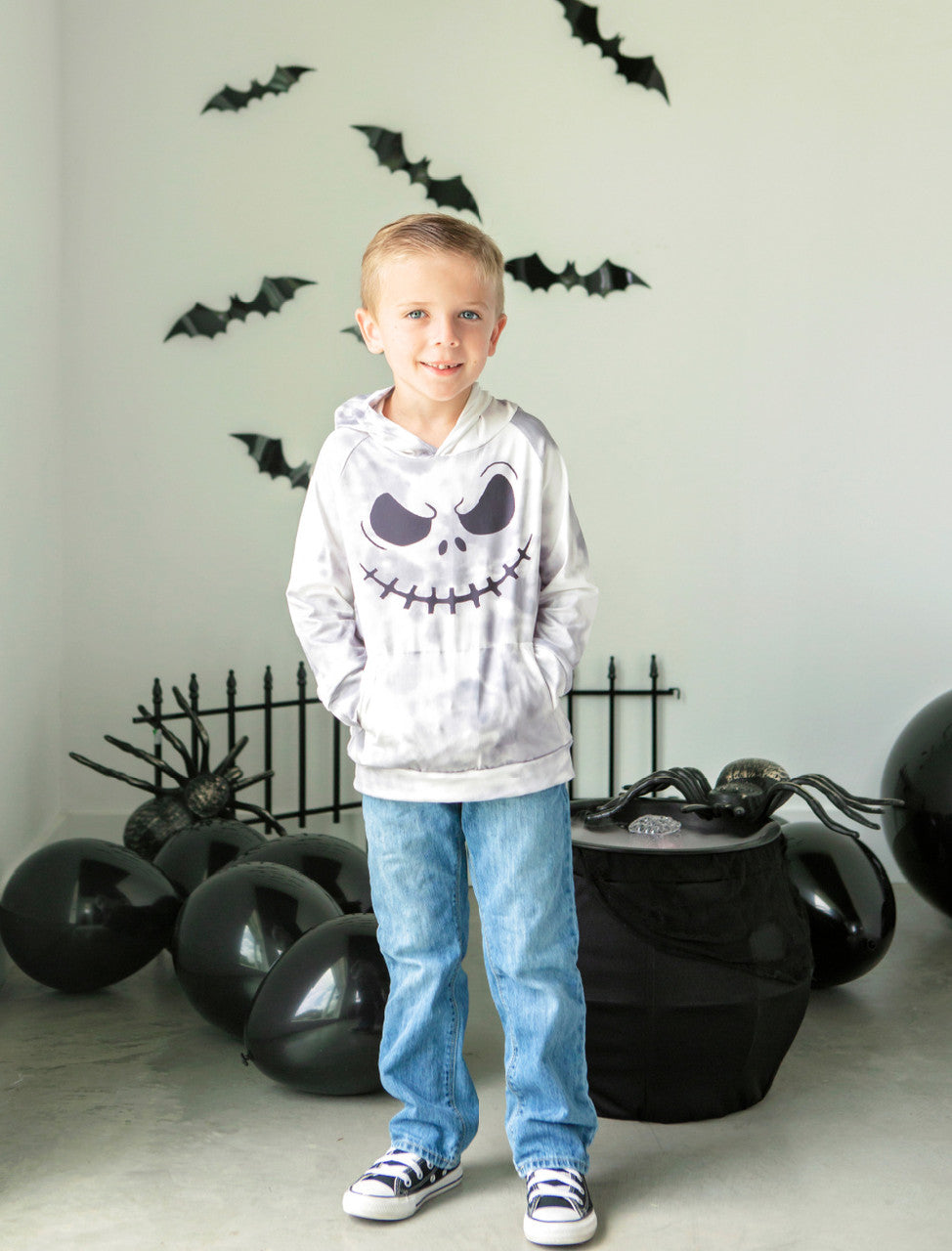 Gray and white hoodie with Jack Skellington printed on the front.