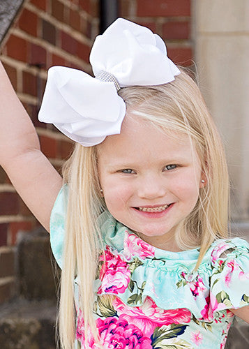 Over sized Rhinestone centered fancy hair bows for girls.