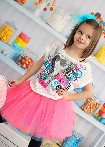 Neon pink tutu layered over turquoise tutu