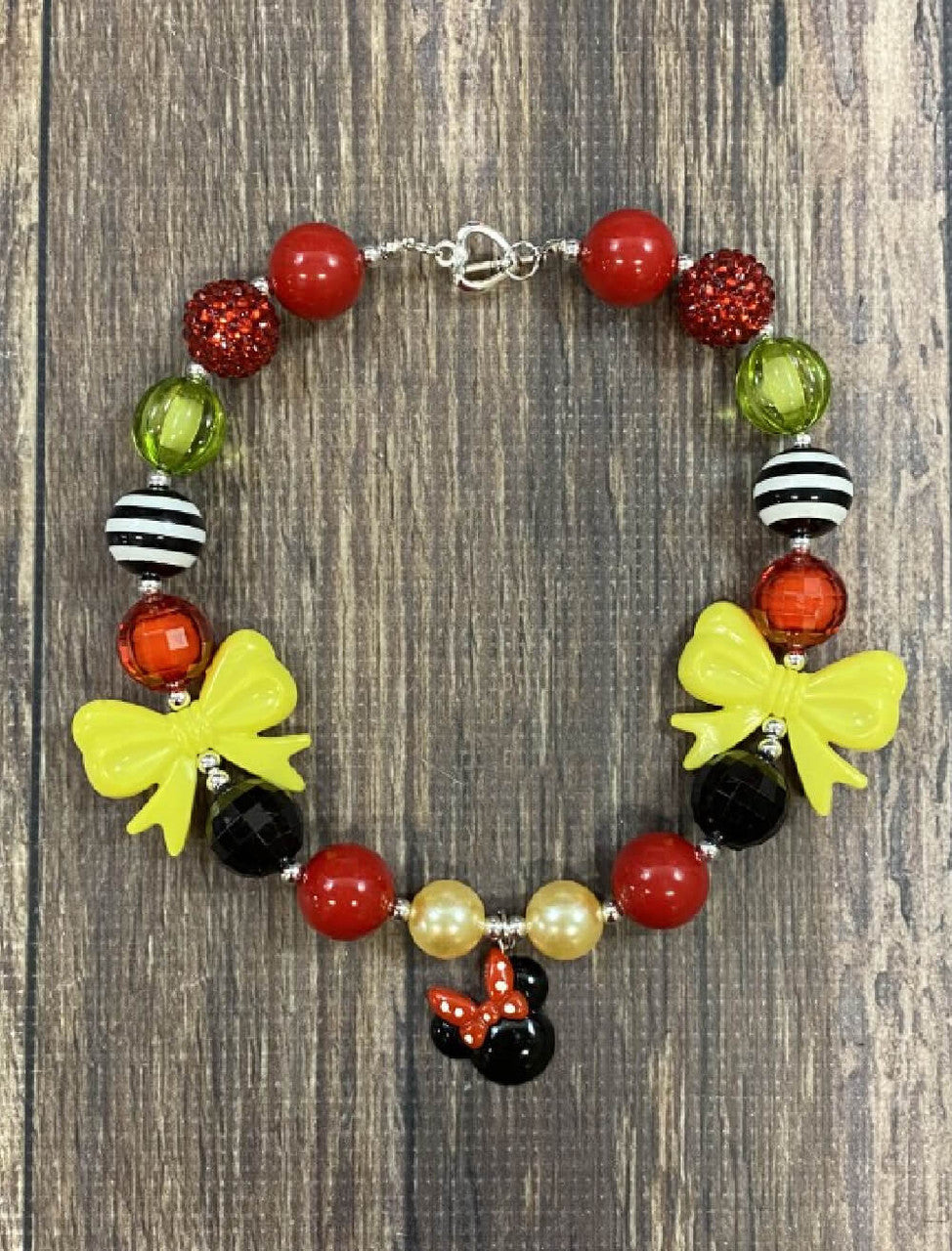 Minnie Mouse necklace in red, black, and yellow.