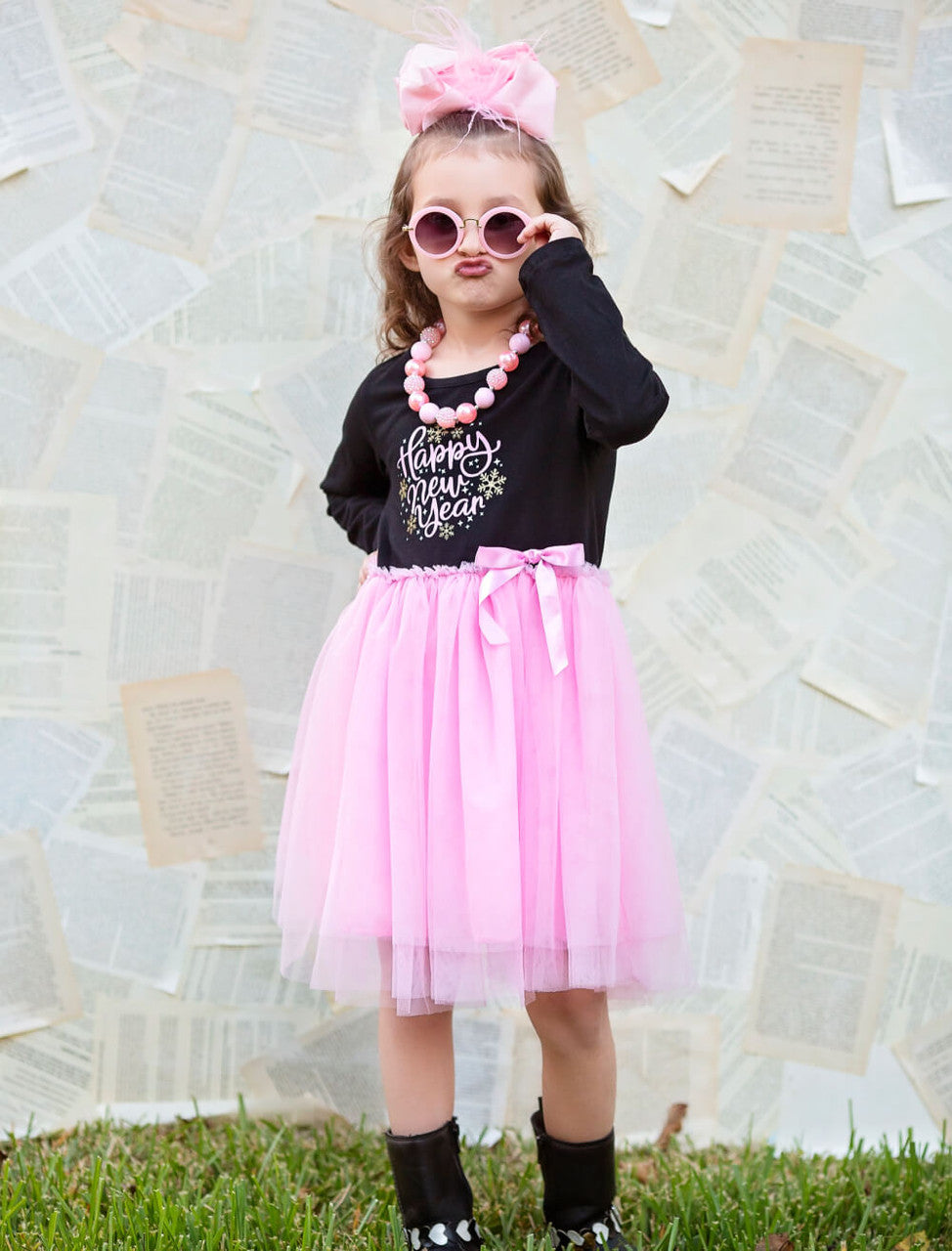 Happy New Year black long sleeve & pink tulle dress with satin bow accent. 