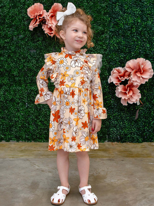 Cream Dress with Colorful Daisy Print on Model.