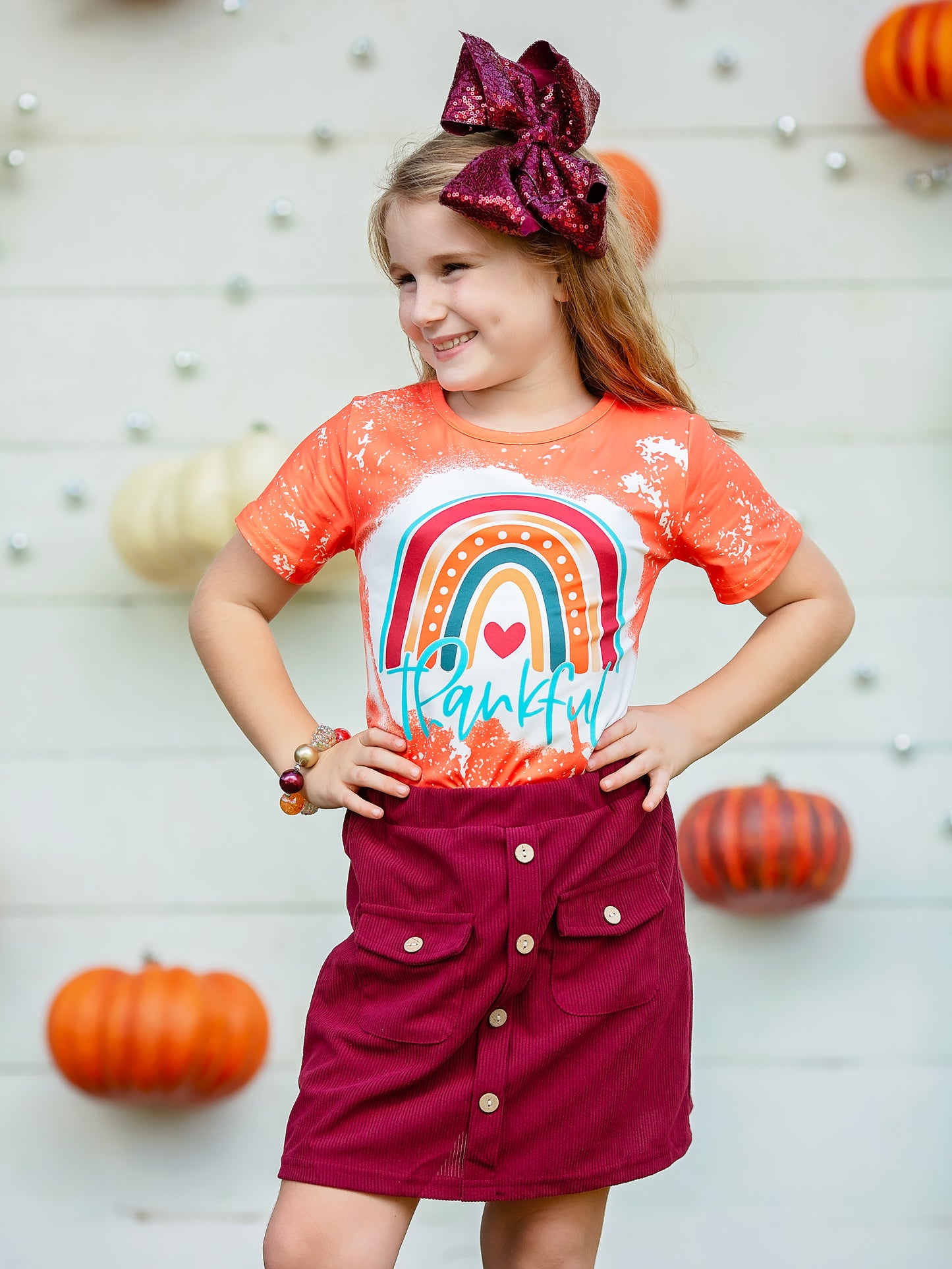 Thankful Orange Rainbow Tee on a model