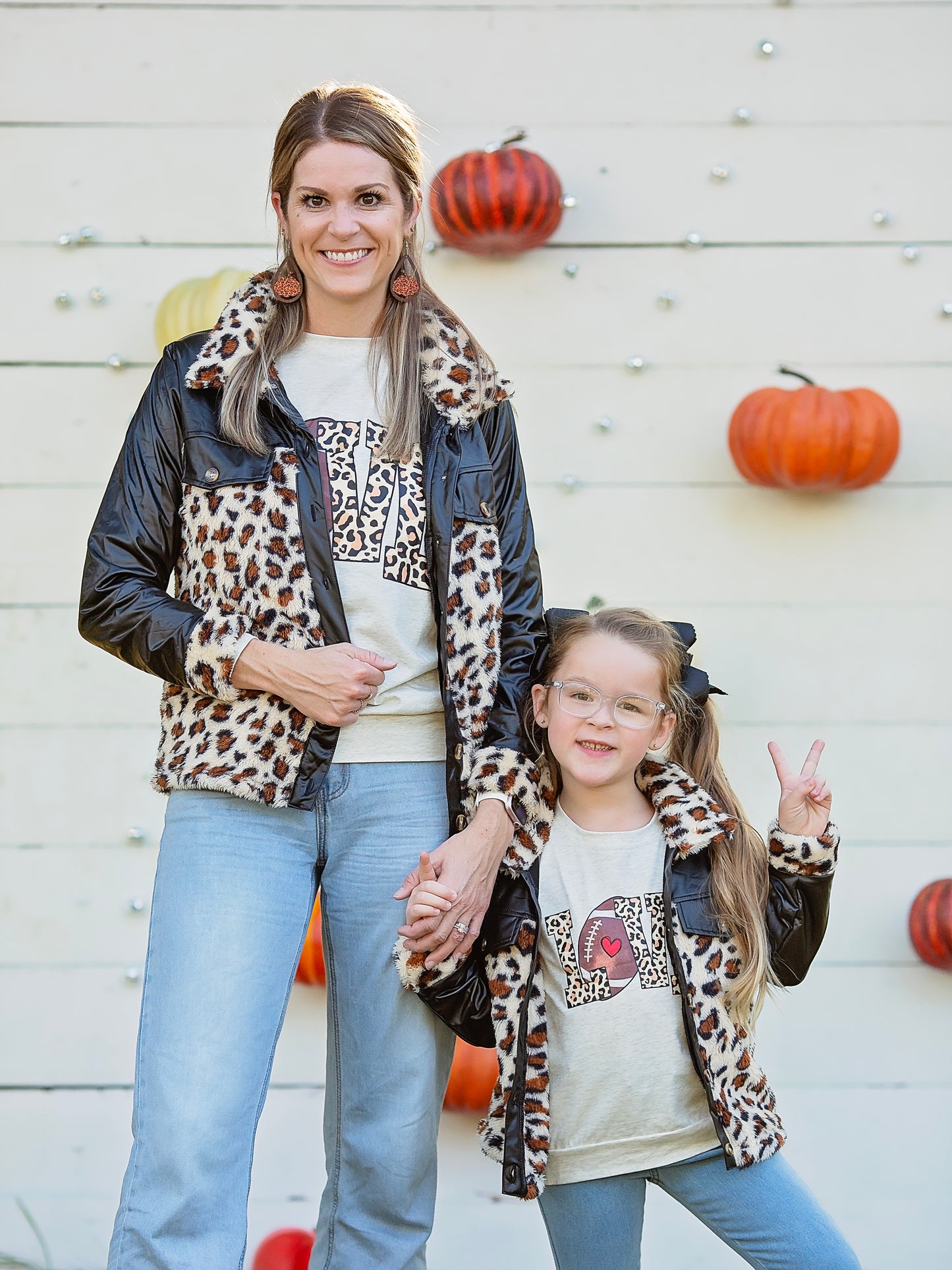 Mommy & Me Black Animal Print Coat on an adult and child model