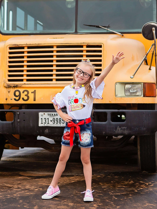 Model wearing First Grade Cutie Ruffle Sleeve Shirt