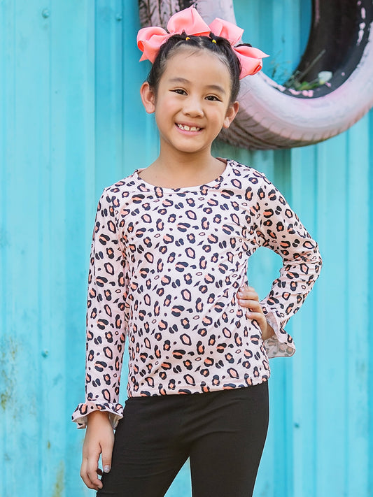 animal print long sleeve top on a model