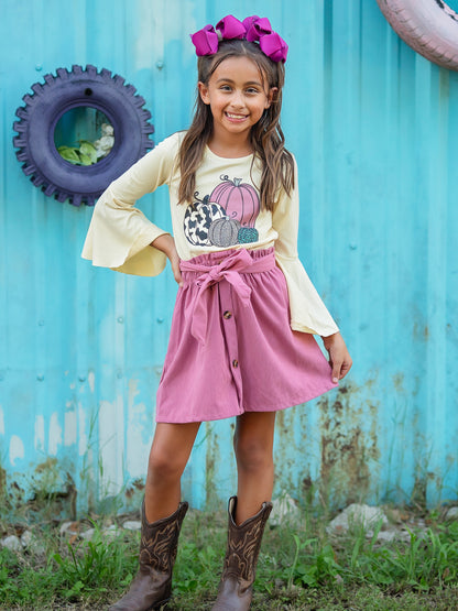 pink pumpkin skirt set on a model