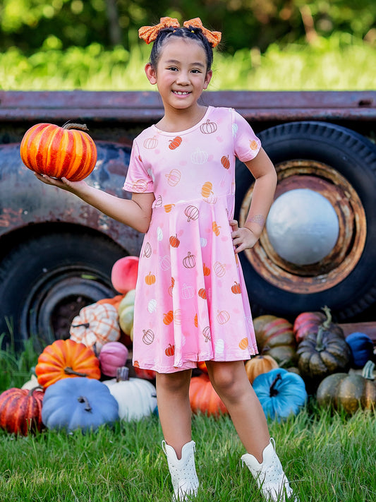 pink pumpkin twirl dress on a model