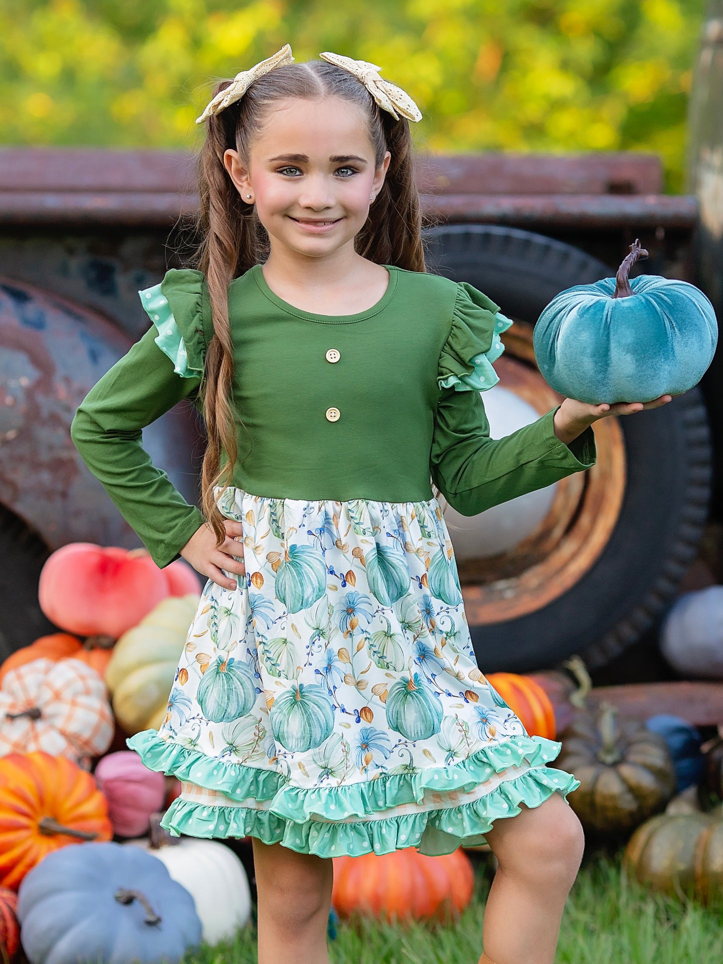 Green Polka Dots & Pumpkins Tiered Dress on a model