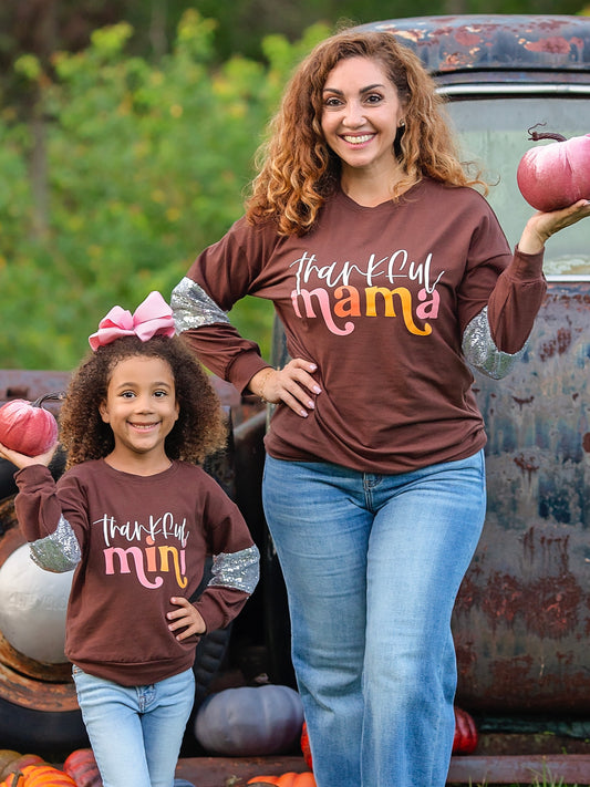 brown thankful sequin sleeved tops on mommy & me models