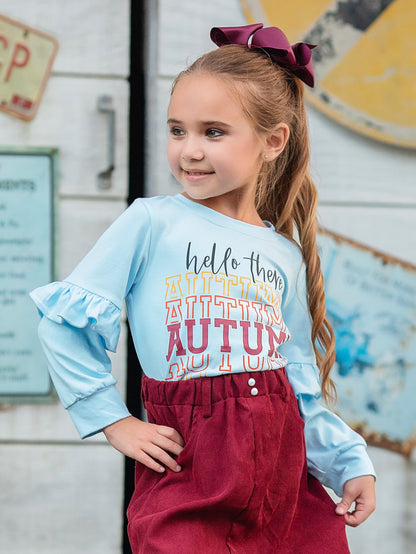 hello autumn blue ruffled sleeve top on a model