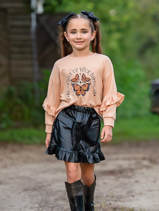 ruffled long sleeve with butterflies and black skirt outfit set on a model