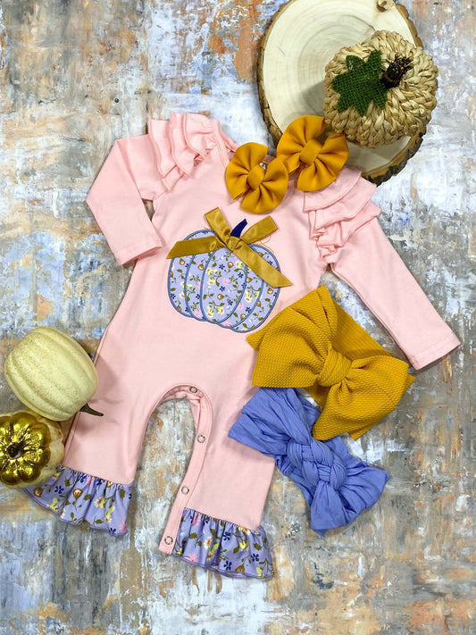 Pink romper with lavender floral print pumpkin applique and ruffles.