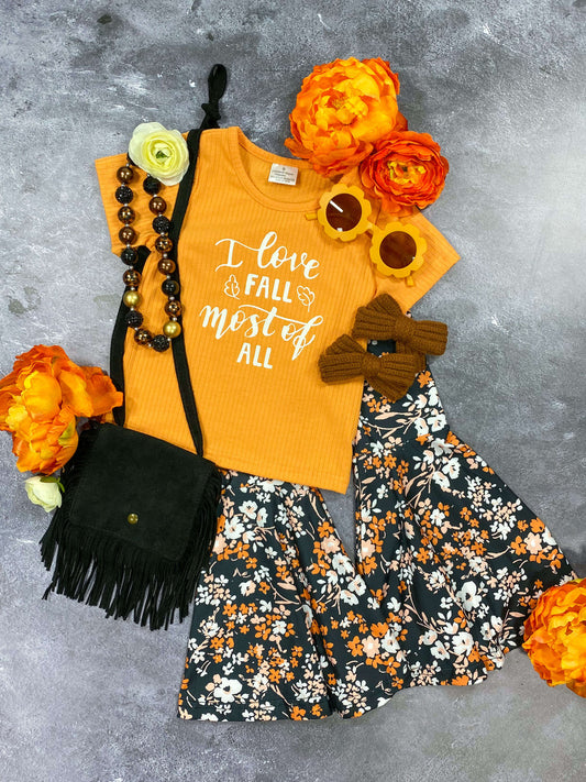 I love Fall top with black floral bell bottoms.