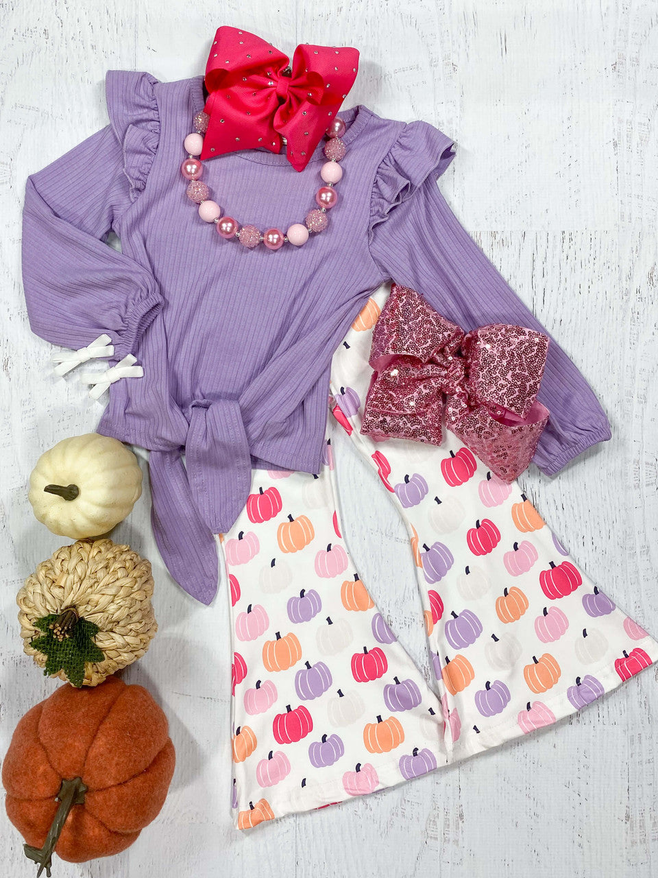 Purple long sleeve top with pumpkin print pants 