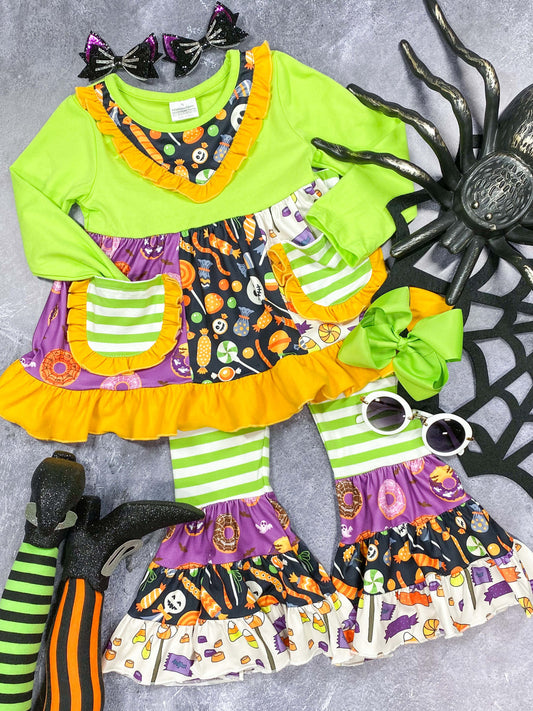 Tunic top and bell bottom pants set in bright colors nd Halloween treats prints.