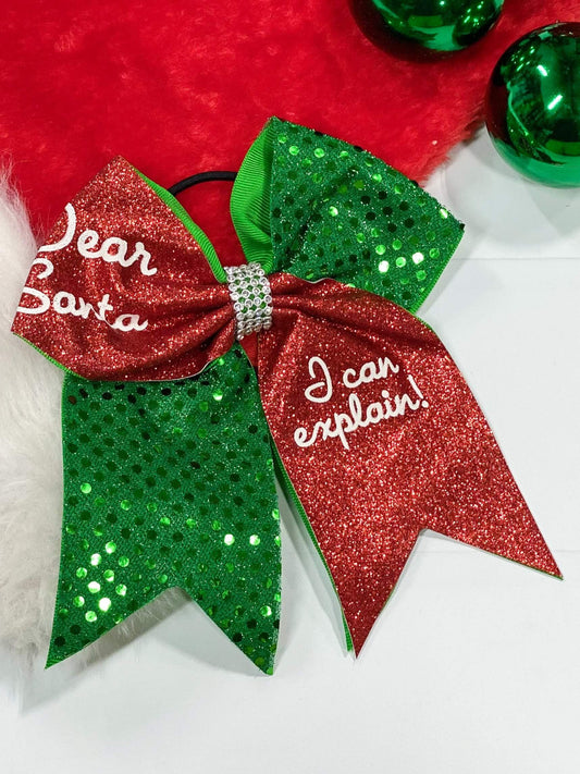 This bow says it all! "Dear Santa, I can Explain!" sequin and glitter Christmas cheer bow with alligator clip backing.