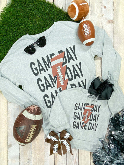 Mommy & Me Game Day football print lightning bolt sweaters