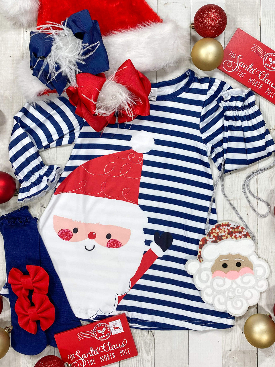 Blue & white striped dress with waving Santa applique. 