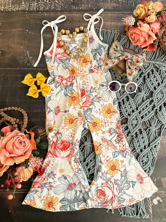 white tie jumpsuit with floral designing and flare