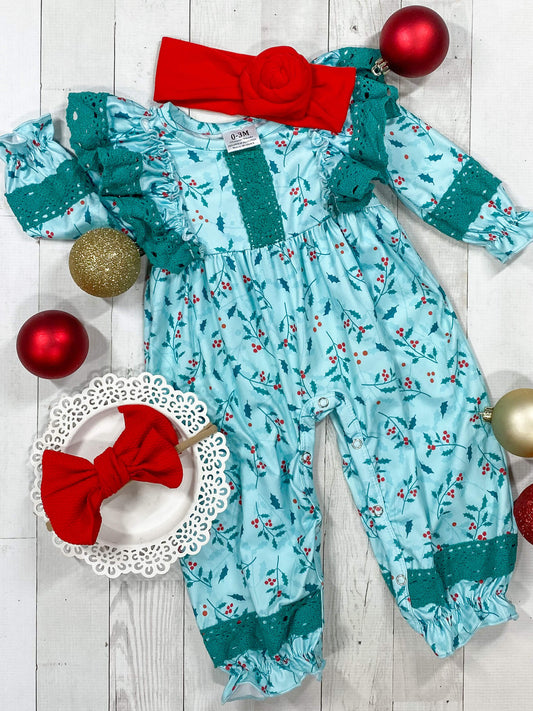 Teal ruffled holly print jumper onesie with snap closure.