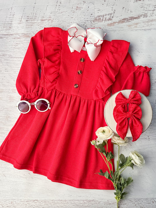 Red waffle knit girls dress with shoulder ruffles