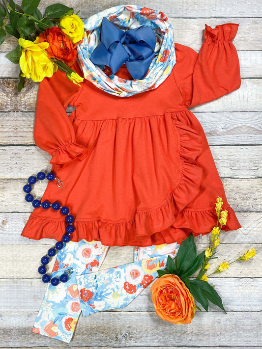 Orange long sleeve tunic top with coordinating floral print leggings and a matching scarf