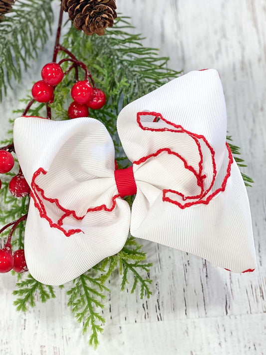 White 4.5" Hair bow with red center and contrasting red stitching on outside of bow