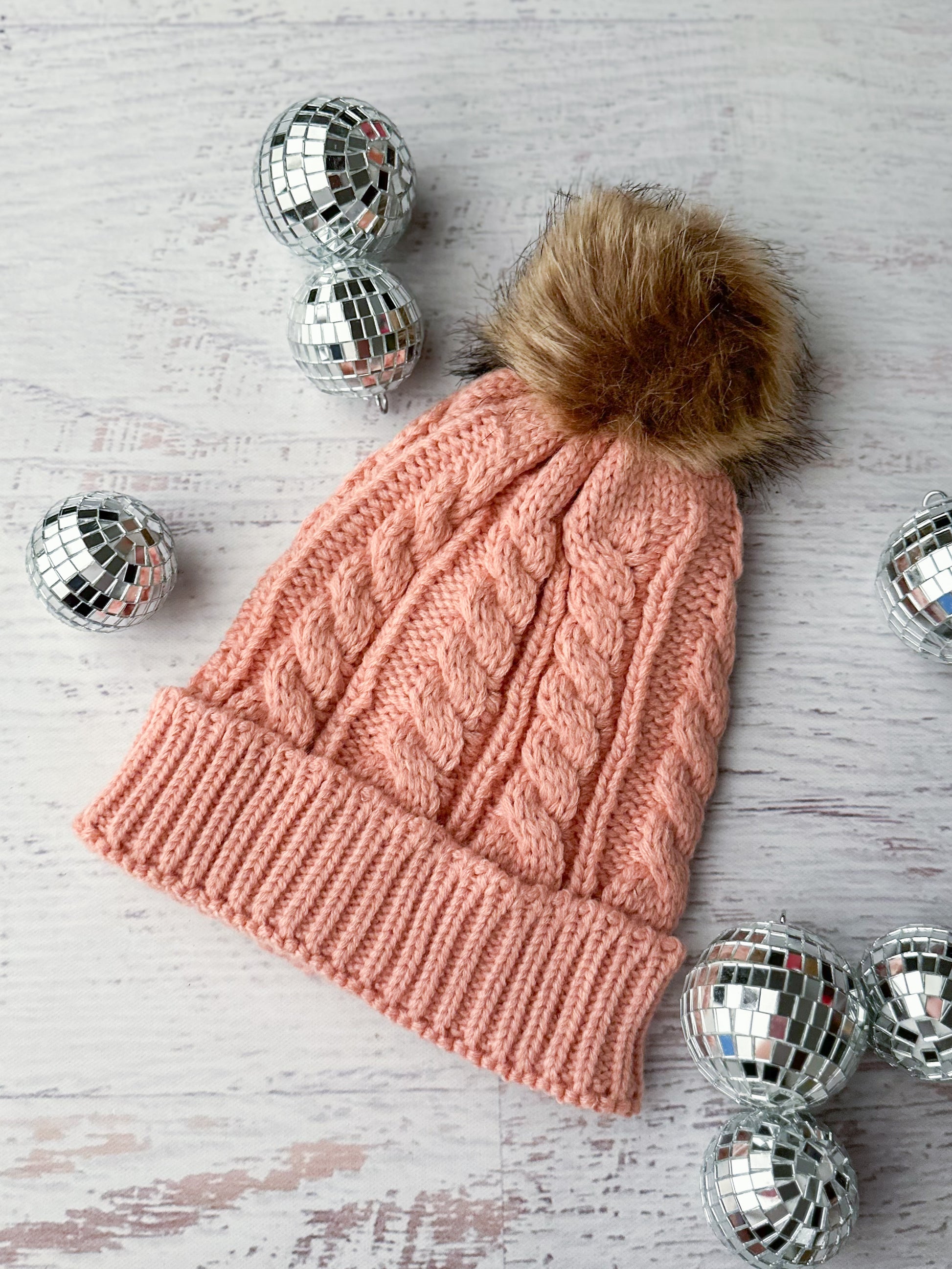 Matching mommy & me knit beanies in light pink with brown fur top knots - Moms