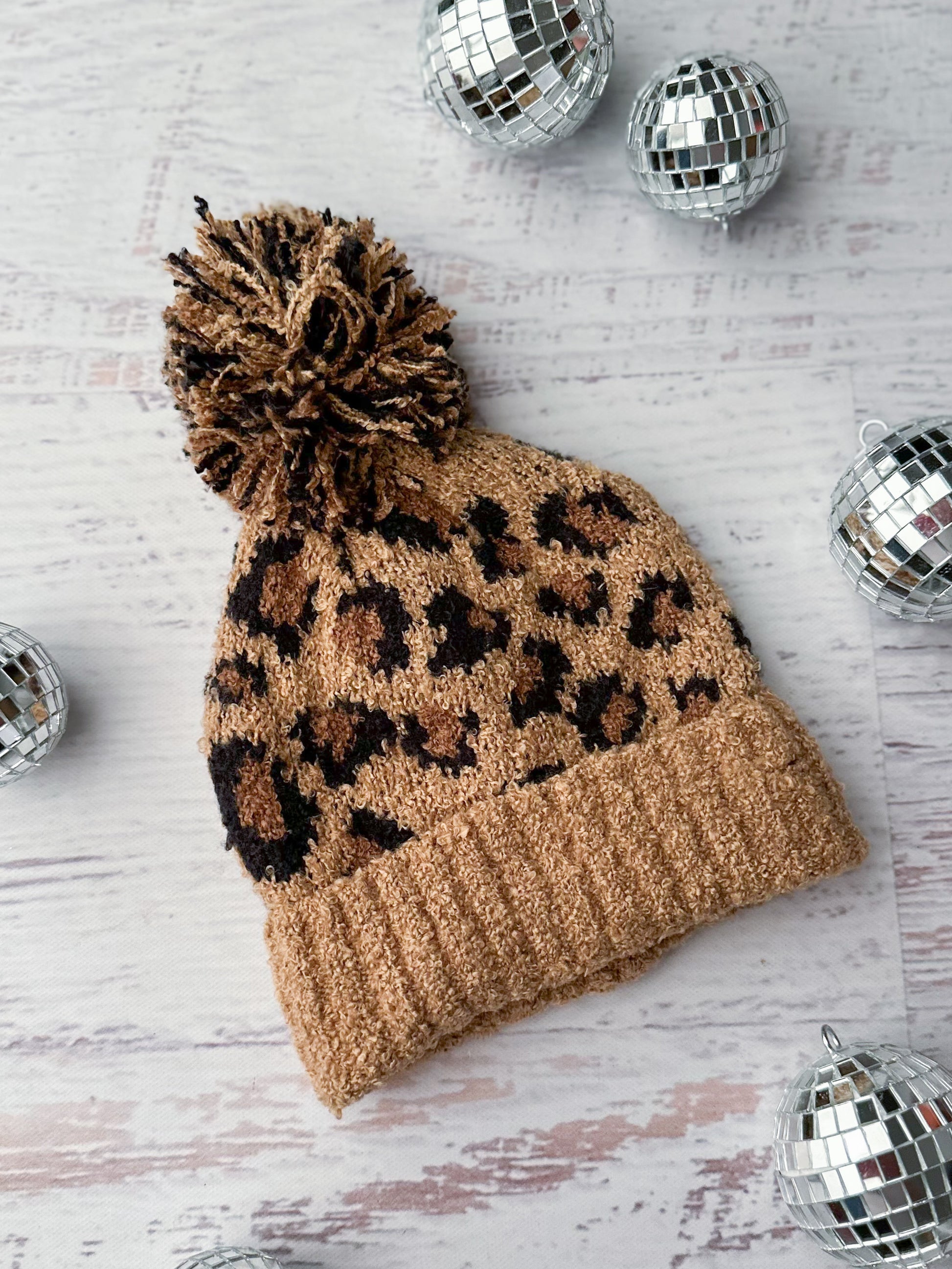 Matching mommy & me animal print beanies with a top knot - Girls