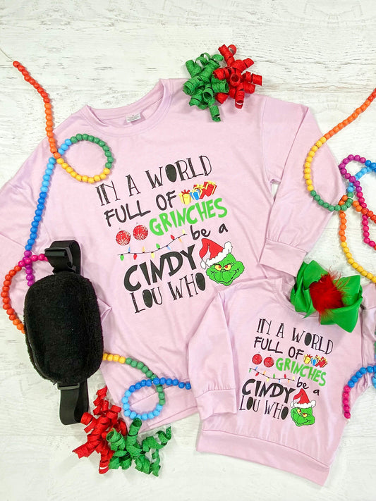 Mommy & Me sweatshirt with a colorful Grinch design