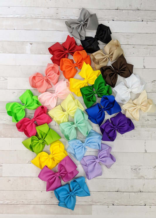 Our favorite extra large grosgrain hair bows for girls available in variety packs of our most popular colors to build your bow collection!