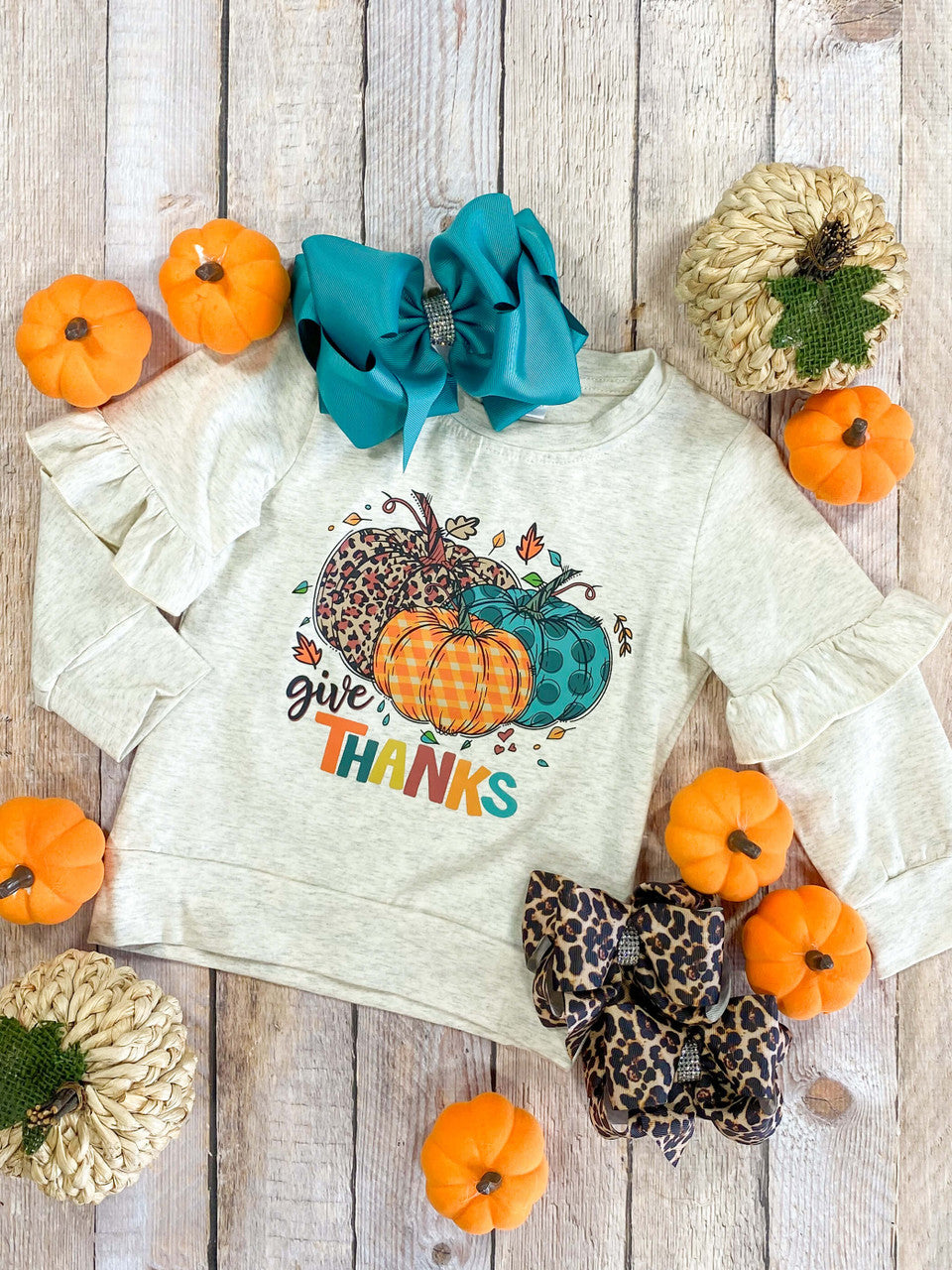 Long sleeve ruffle top with Give Thanks design