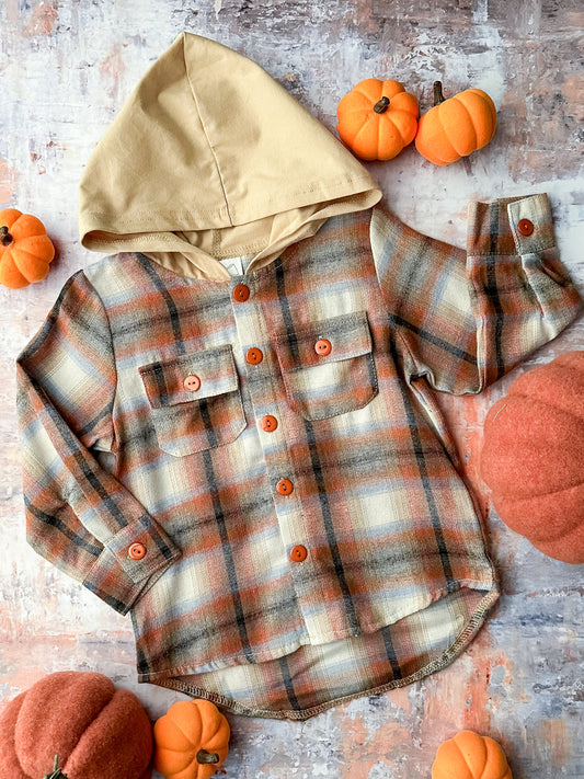 Long sleeve button down flannel top in fall colors with a tan hood