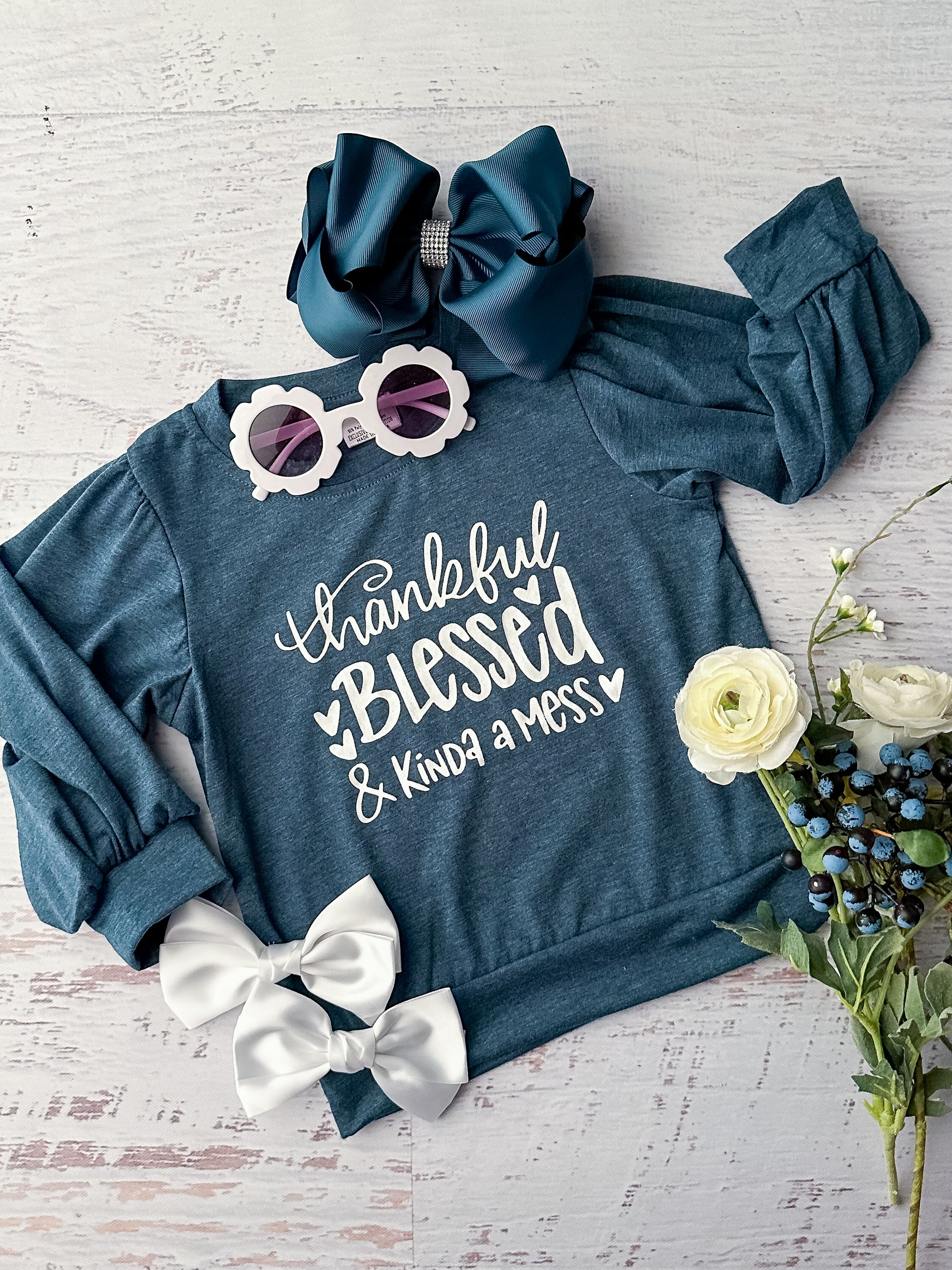 Long sleeve top in jade with the saying 'Thankful blessed & kinda a mess'