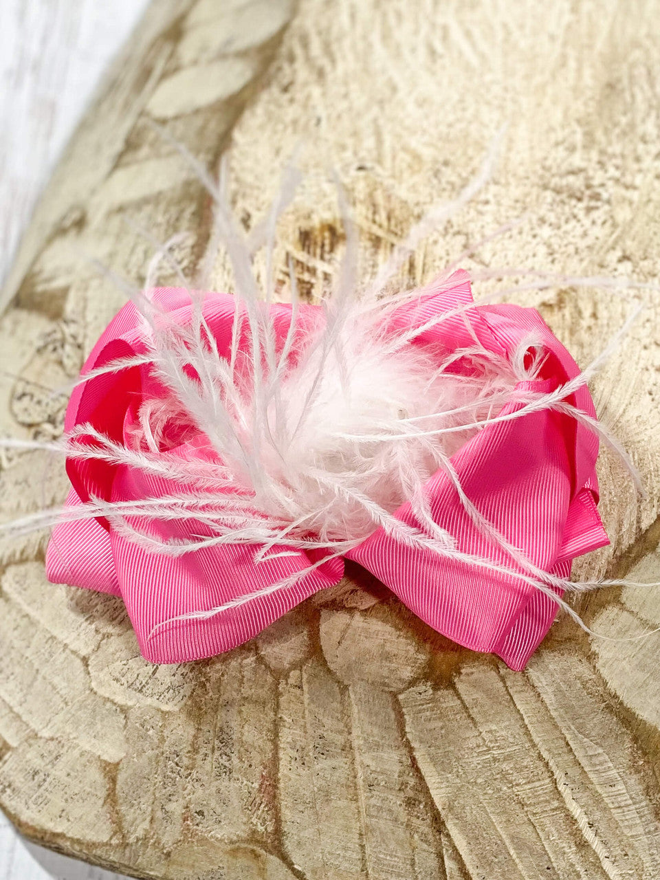 Pink Bow With White Feather Puff.