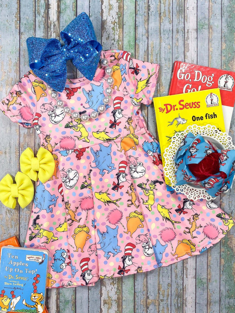 Pink Twirl Dress With Dr. Seuss Characters.