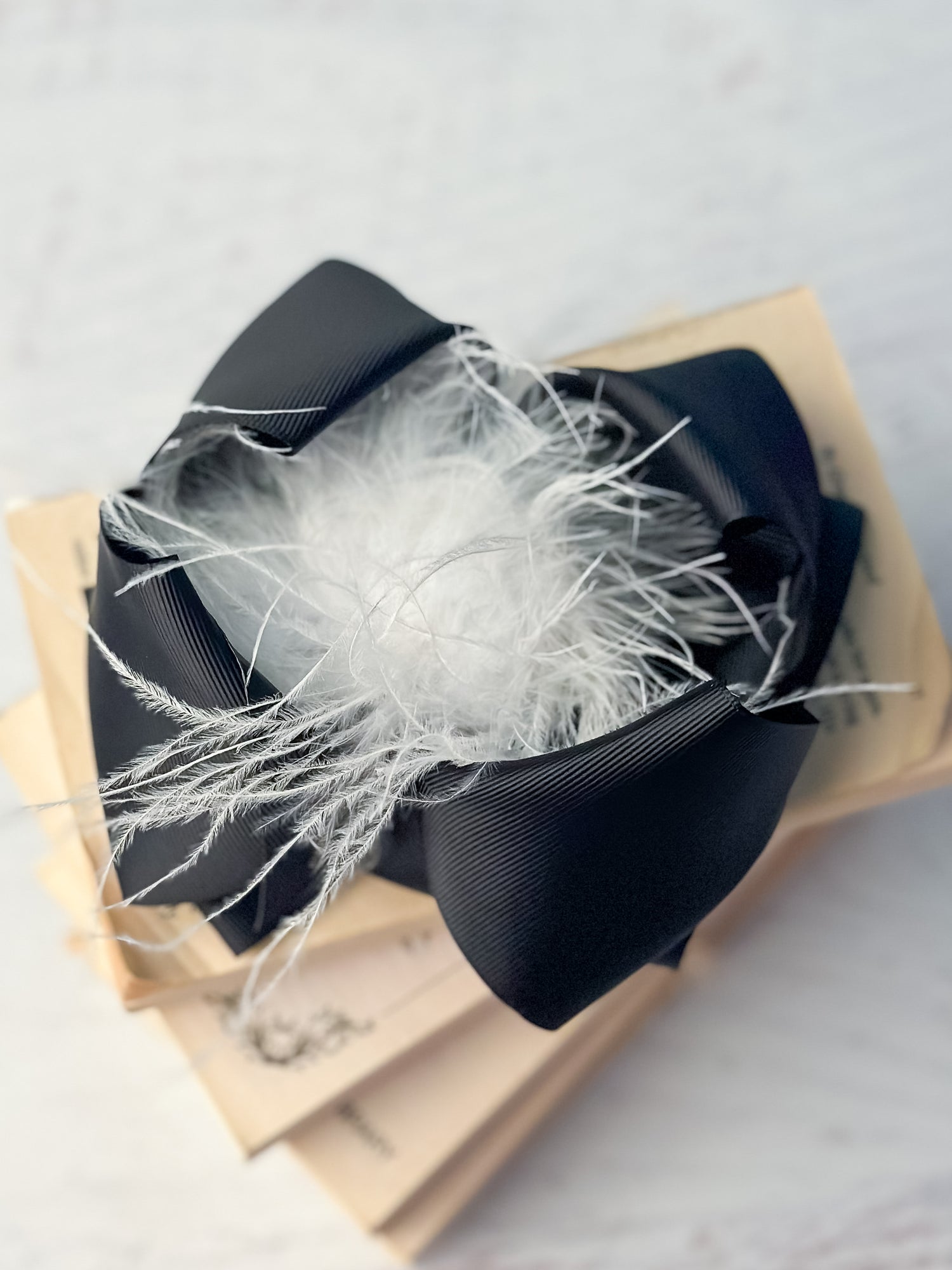 Texas Size Black & White Feather Puff Hair Bow front