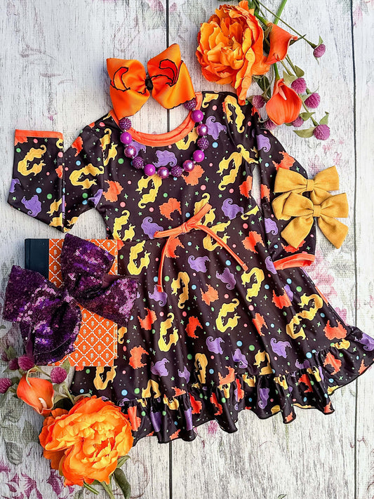 adorable twirl dress with hocus pocus hair and orange detailing