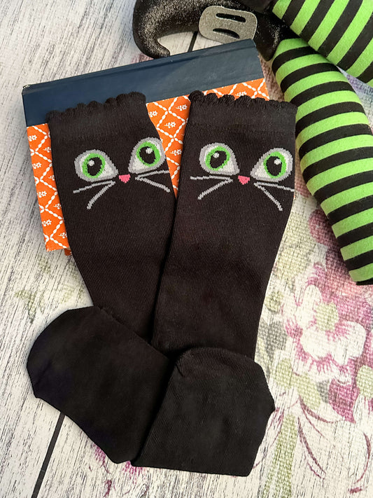 black cat with green eyes halloween socks