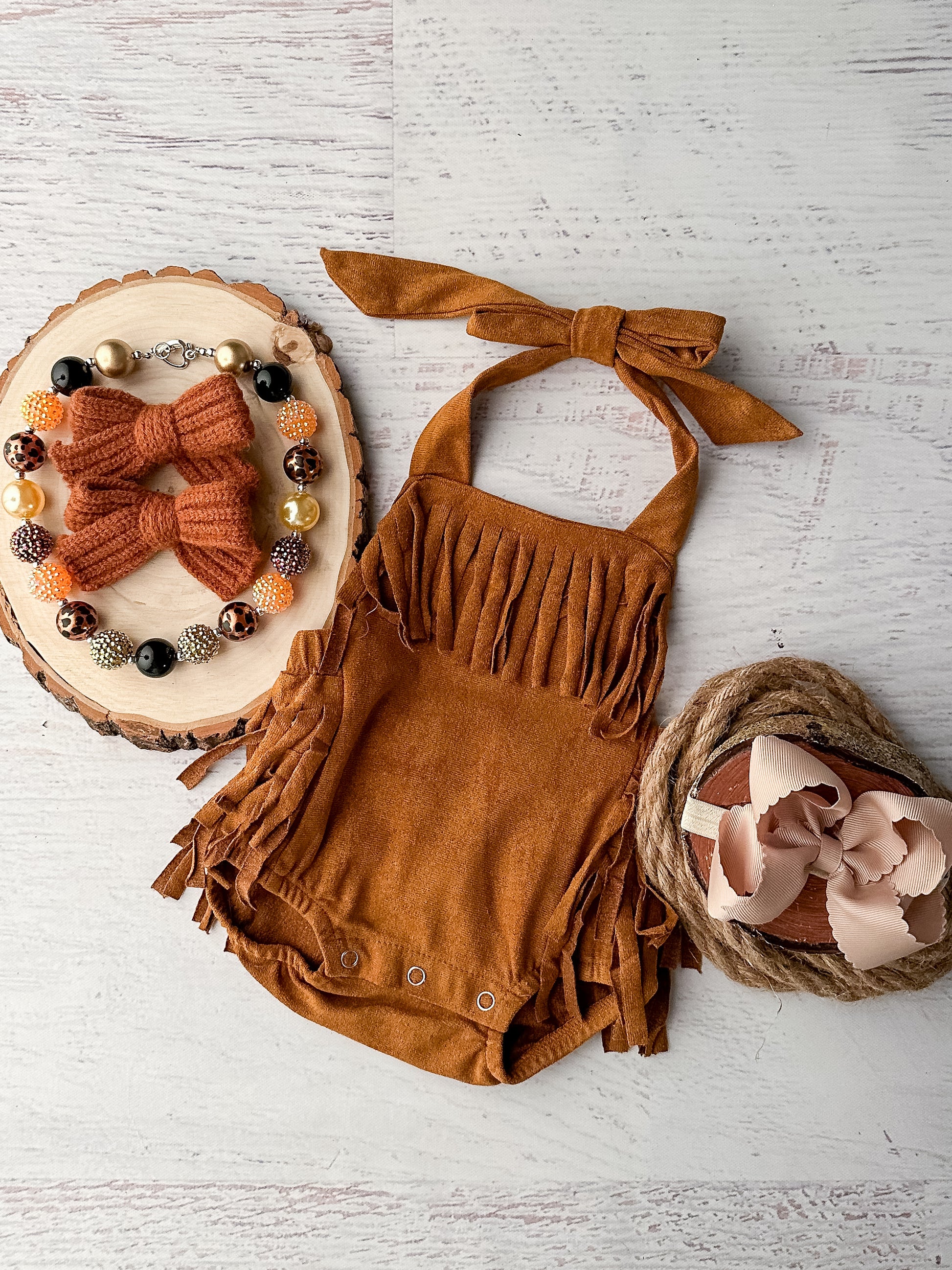 Chocolate fringe baby romper